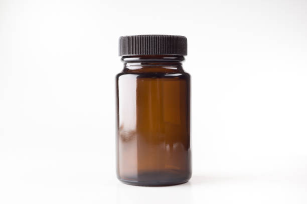 medical jars with dark glass caps