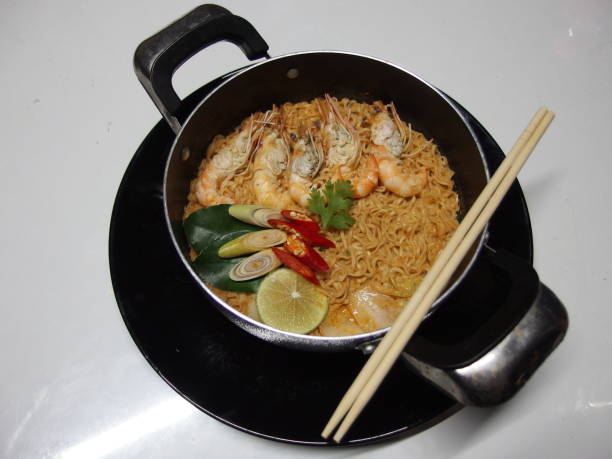 Instant noodles, Tom Yum Kung, consisting of Tom Yum soup. To the real tom yum machine