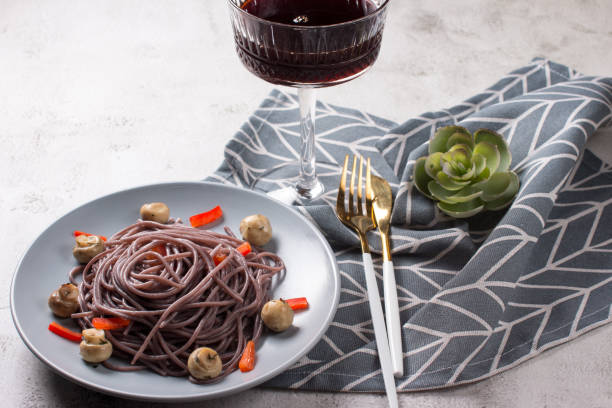 black spaghetti with red pepper on a plate. Korean food