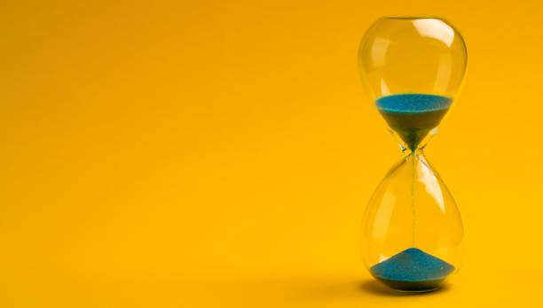 istock Blue retro hourglass to measure time 2152490369