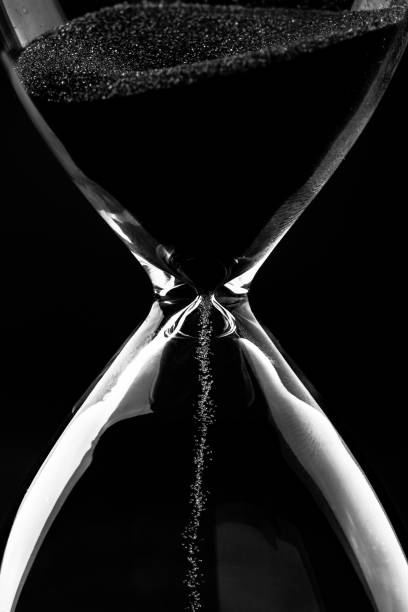 istock Blue sand hourglass on black background 2152490788