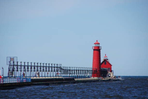 istock Grand Haven Pier and Lighthouse 2152493235