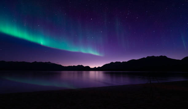 Southern Lights over Lake Te Anau. Southern lights over Lake Te Anau, Fiordland, New Zealand. aurora polaris stock pictures, royalty-free photos & images