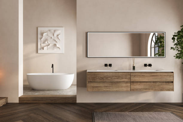 istock Beige bathroom interior with white basin and mirror, parquet floor, bathtub, plants. Bathing accessories and window in hotel studio. 2152516653