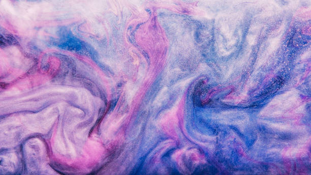 istock Glitter paint texture fluid mix purple ink marble 2152517799