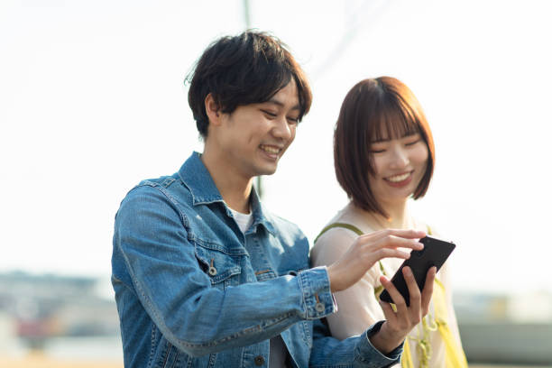 istock Couple having fun at the seaside 2152520625