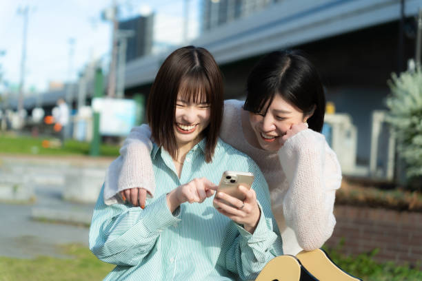 istock Woman having fun playing in the park 2152522907