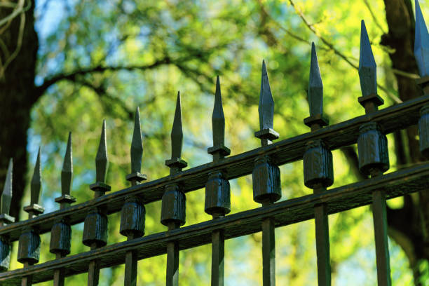 istock Top part of a metal fence with very sharp tips 2152524854