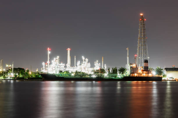 istock Oil refinery at night with lighting 2152539986