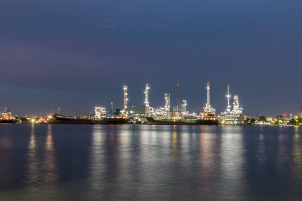 istock Oil refinery at night with lighting 2152540002