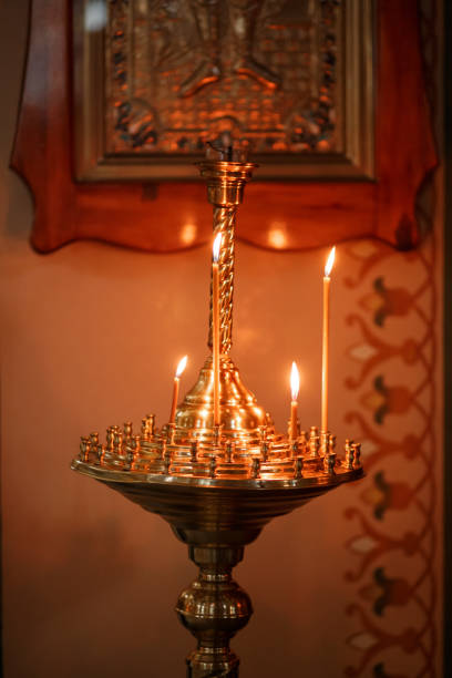 Church candlestick with many burning candles