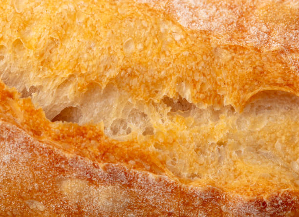 istock Ruddy crust of bread as an abstract background. Texture 2152544873