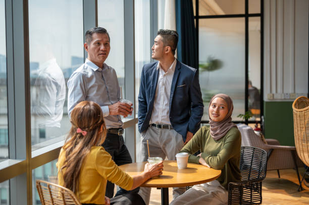 istock Business office employees gathering 2152547419