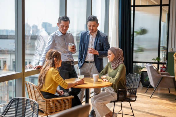 istock Business office employees gathering 2152547444