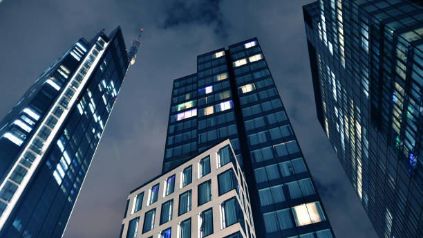 istock Office buildings by night. Night architectural, buildings with glass facade. 2152548663