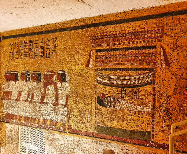 Tomb of Tutankhamun,KV62 in Valley of Kings,Luxor,Egypt Wall relief depicting Pharoah Tutankhamun's mummy being dragged by court officials inside the famous Tomb of Tutankhamun,KV62,discovered by Howard Carter in 1922 in the Valley of Kings at Luxor,Egypt howard carter stock pictures, royalty-free photos & images
