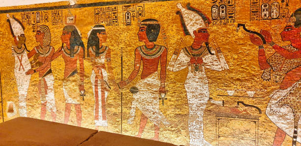 Tomb of Tutankhamun,KV62 in Valley of Kings,Luxor,Egypt Painted wall relief depicting Tutankhamun and his soul,Ka,embracing Osiris and Goddess Nut inside the famous Tomb of Tutankhamun,KV62,found by Howard Carter in 1922 in the Valley of Kings,Luxor,Egypt howard carter stock pictures, royalty-free photos & images