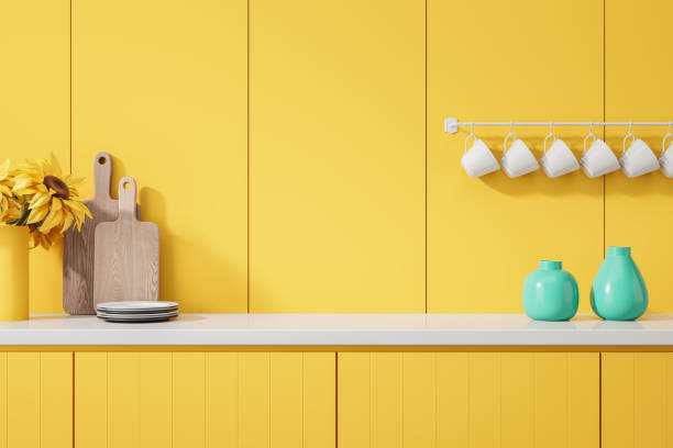 istock Yellow home kitchen interior with decoration and kitchenware on cooking counter 2152552714