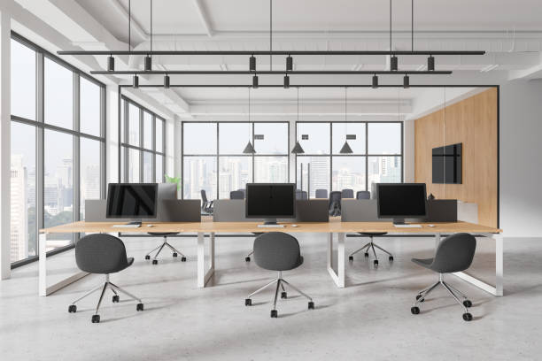 istock Gray and white board room and open space office interior with TV 2152552893