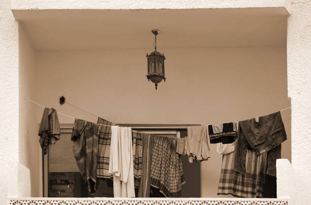 Sepia Toned Balcony With Clothes Lantern Urban Life