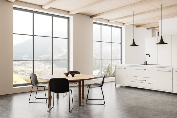 istock Minimalist home kitchen interior with cooking and eating space, panoramic window 2152554426