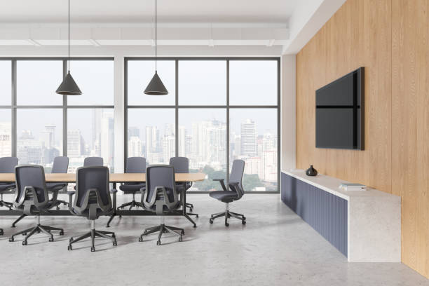 istock White and wooden board room interior with TV set 2152554609