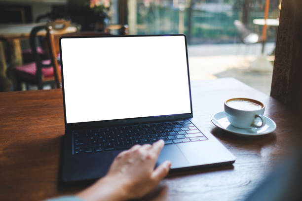 istock Mockup image of a woman working and touching on laptop touchpad with blank white desktop screen 2152554881