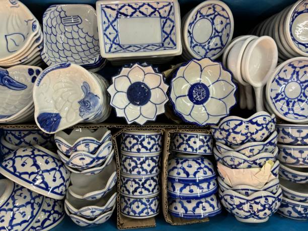 istock Assorted traditional blue and white porcelain dishes, spoons, and bowls with Asian pattern, neatly arranged in boxes 2152556541