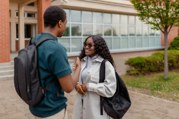 istock College Student Talking in Front of the Faculty Building 2152560557
