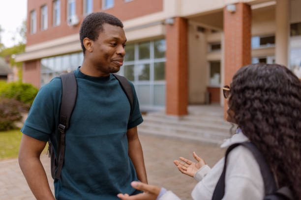 istock College Student Talking in Front of the Faculty Building 2152560568