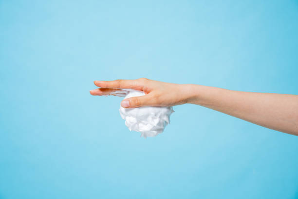 istock Asian hand and bubble textures photographed against a blue background 2152563166