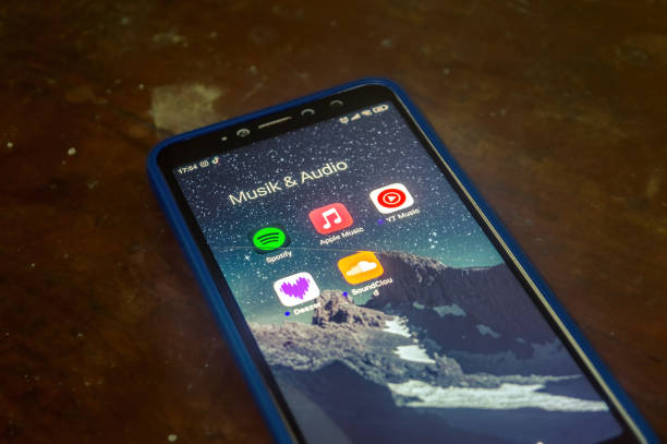 a Xiaomi Android smartphone that displays a collection of applications or music streaming platforms, Indonesia, 11 May 2024.