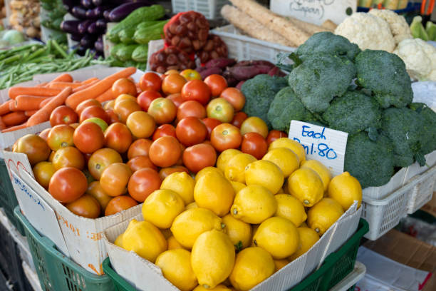 An array of multi-colored fruits and vegetables showcased at the Asian market stall