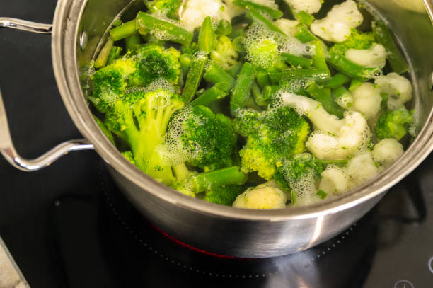 istock A pot of vegetables is boiling on a stove 2152571935