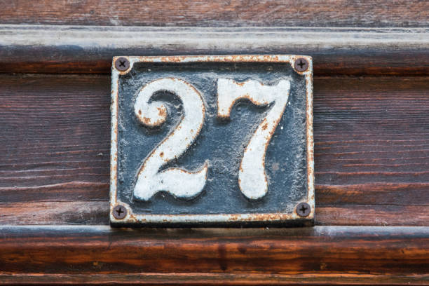 istock Old retro cast iron plate number 27 2152573728