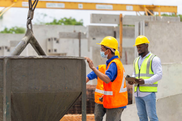 istock Engineer man and builders team in hardhats discussing on construction site, Foreman and worker checking project at the precast factory site 2152575888
