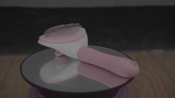 istock Modern combs made of plastic are used to groom thick and irregular cat 2152576282