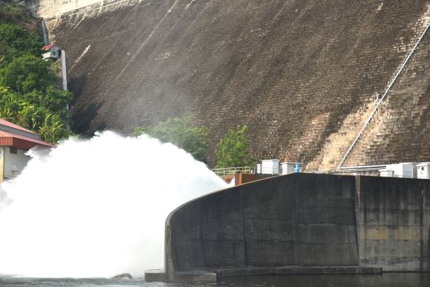 istock water splashing from floodgate Khun Dan Prakarn Chon huge concrete dam 2152579419