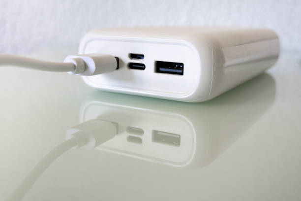 istock White power bank on a reflective glass background 2152579560