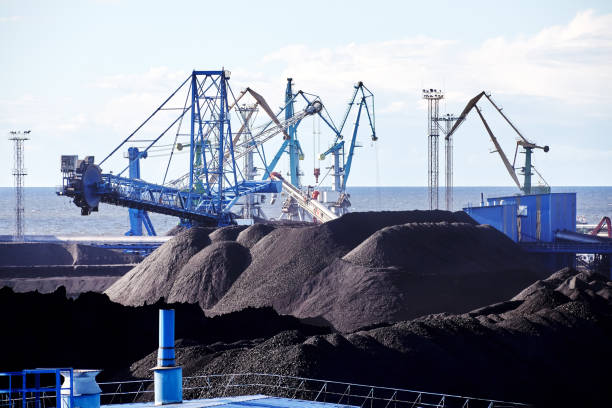 istock At dry bulk terminal combined machine for stacking
and reclaiming, stacker reclaimer, to handle of coal. 2152585713