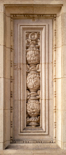 istock Art nouveau style carved panel on a building exterior. Ornate decorative panel with leaves and flowers. Traditional design in limestone. 2152585963