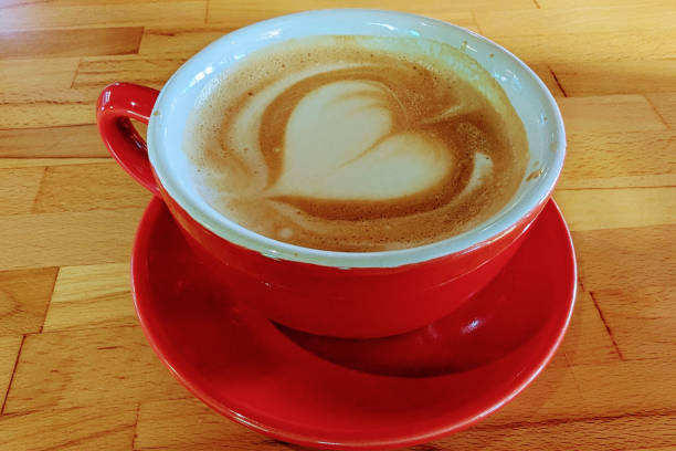 istock Red cup of cappuccino in a coffee shop 2152587798