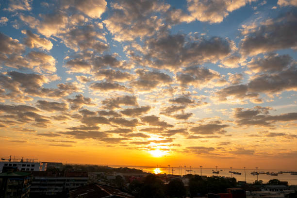 istock Scenic view dramatic beautiful sunset sky. Natural Sunset Sunrise on meadow silhouette shadow dark land. Vibrant dramatic sky on sunset, dawn, sunrise in Countryside. Landscape Colorful Sky At Sunset 2152590061