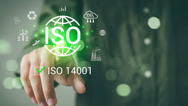 istock ISO 14001 concept. ISO standards quality control 14001 certified for environmental management systems (EMS). Identify, control and reduce the environmental impact of activities. Modern ISO banner. 2152599141