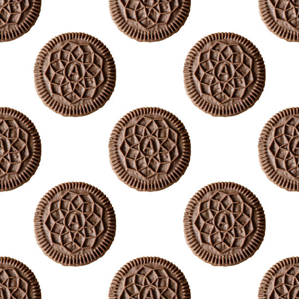 Seamless pattern one round cocoa biscuit with vanilla filling isolated on white background