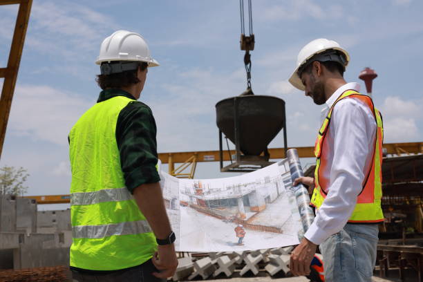 Imagine a construction engineer standing on a building site, intently scrutinizing a drawing blueprint to ensure that the concrete casting process is of top-notch quality. It's fascinating how every little detail on that blueprint matters in building a strong and sturdy structure that can withstand the test of time. imagínese a un ingeniero de la construcción parado en un sitio de construcción, examinando atentamente un plano de dibujo para asegurarse de que el proceso de fundición de concreto sea de primera calidad. es fascinante cómo cada pequeño detalle de es