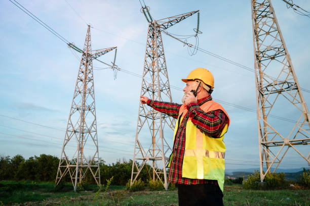 istock Electrician inspecting high-voltage towers 2152605002