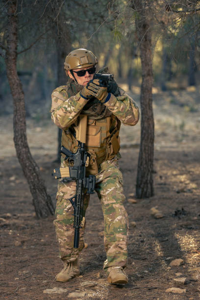 istock airsoft soldier in the forest at sunset 2152610206