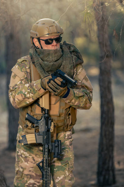 istock airsoft soldier in the forest at sunset 2152610211