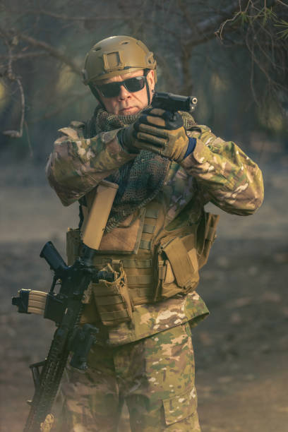 istock airsoft soldier in the forest at sunset 2152610254